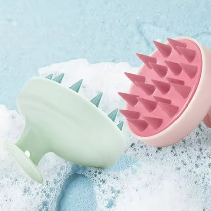 Cepillo estimulador del cuero cabelludo