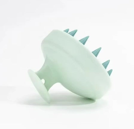 Cepillo estimulador del cuero cabelludo