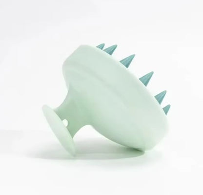 Cepillo estimulador del cuero cabelludo